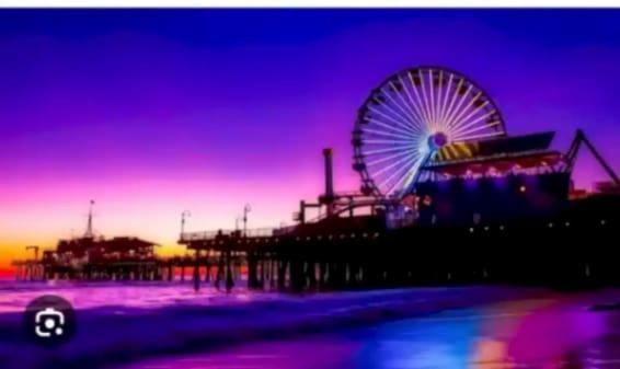 By The Coast Living In Santa Monica Pier Promenade Los Angeles