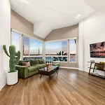 Skyline Oasis: Luxe 3-Floor Waterfront Penthouse