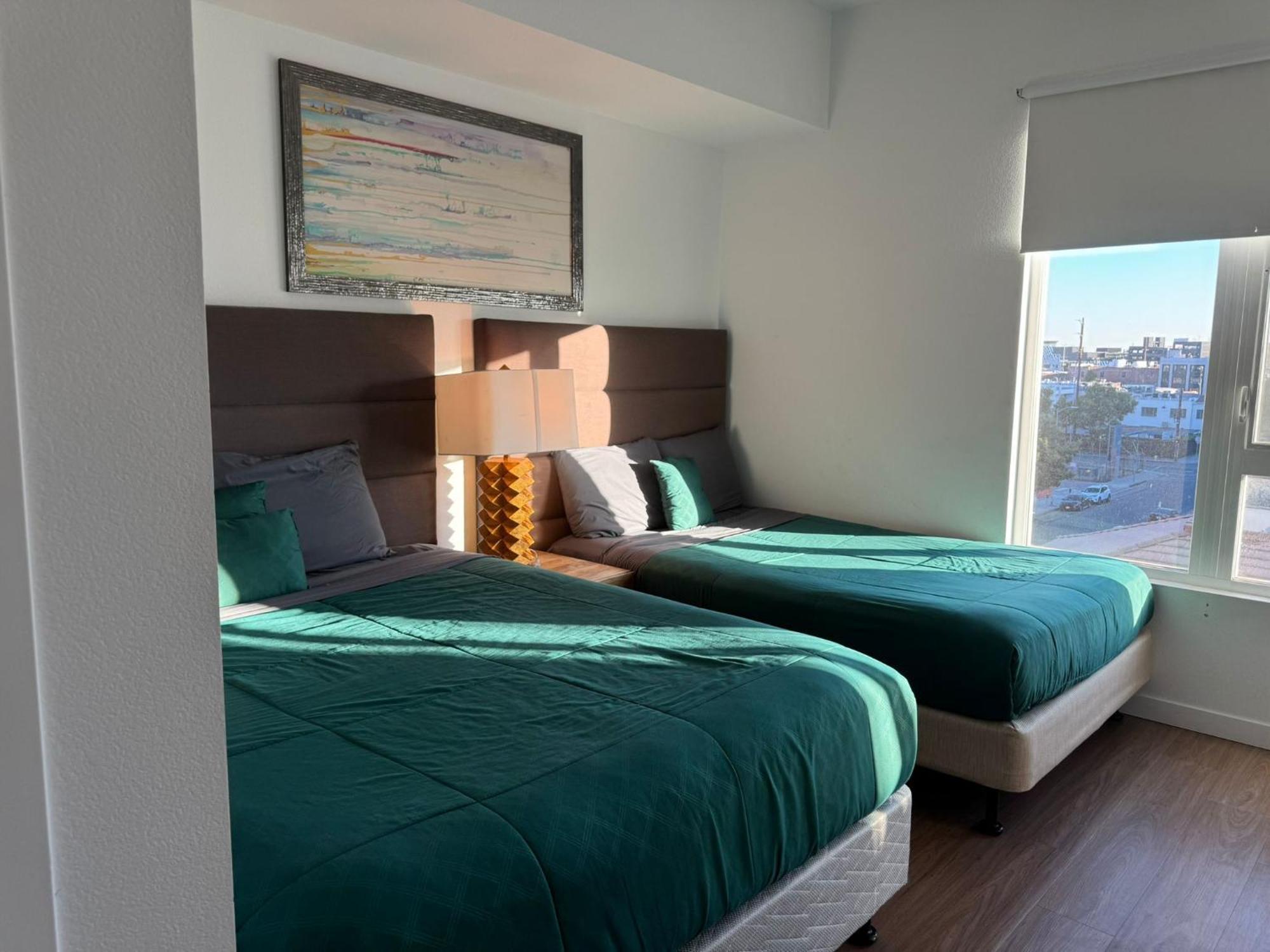 Aparthotel Stylish Downtown Escape With Rooftop Views