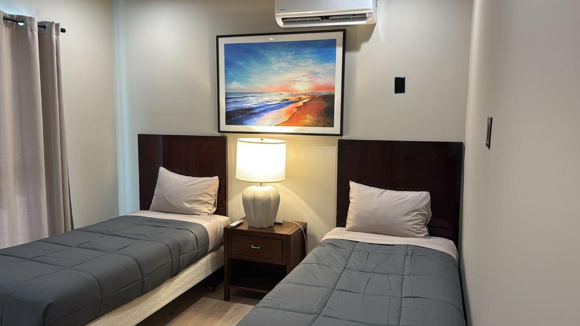 Aparthotel Stylish Downtown Escape With Rooftop Views